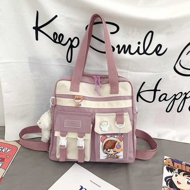 0fcf0fbd-c3cd-43b3-9b5d-7a35f8dbb112.jpg Anime Student Girls Canvas Bag With Badges