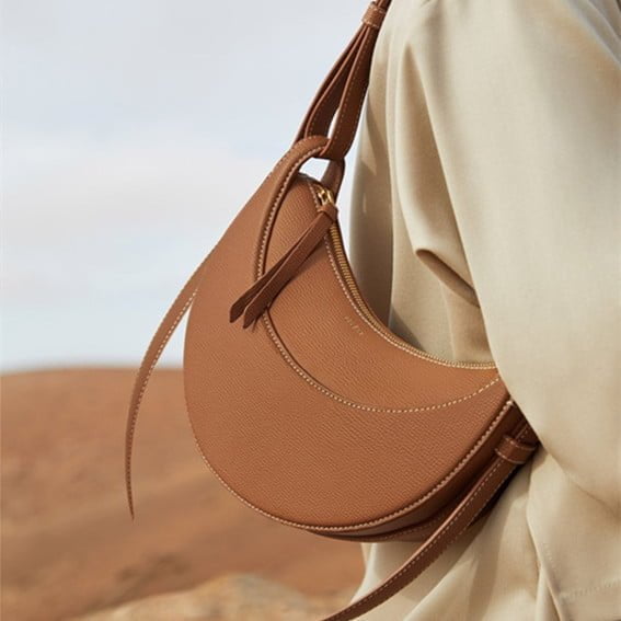 6aeb976e-9069-4e7a-80e5-6be48753d32a.jpg Shaped Leather Shoulder Bag