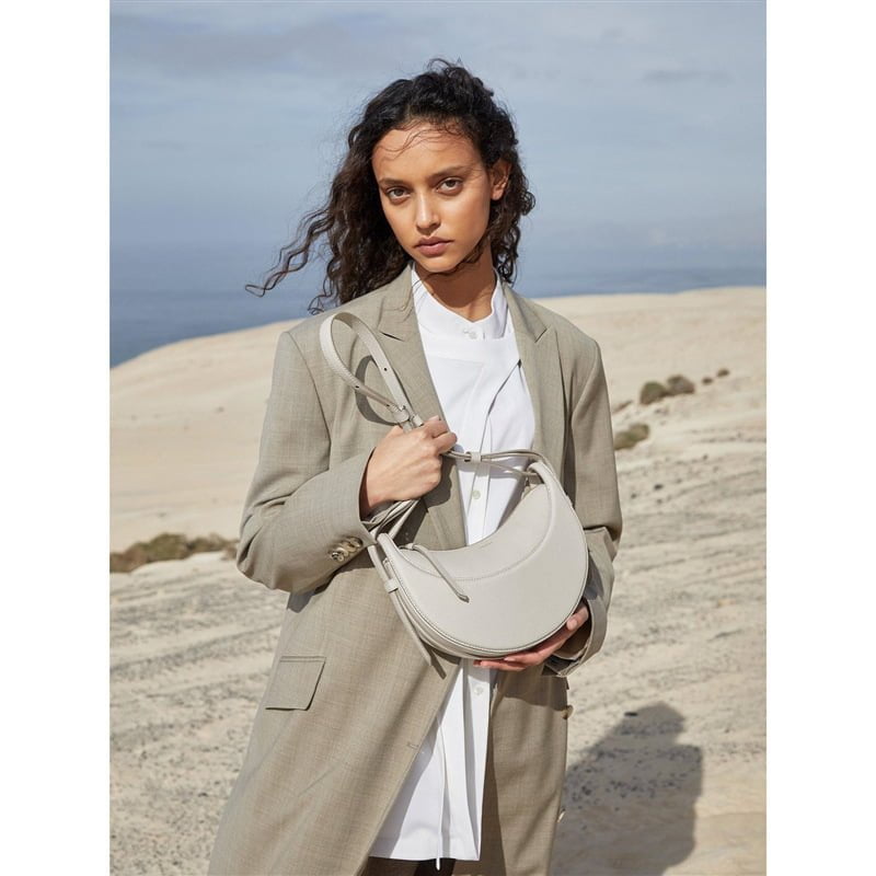 ac00c4cd-e8b5-4a34-998f-dedc98d2761a.jpg Shaped Leather Shoulder Bag
